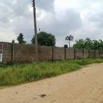 10 plots of land fenced with double two bedroom bungalow inside