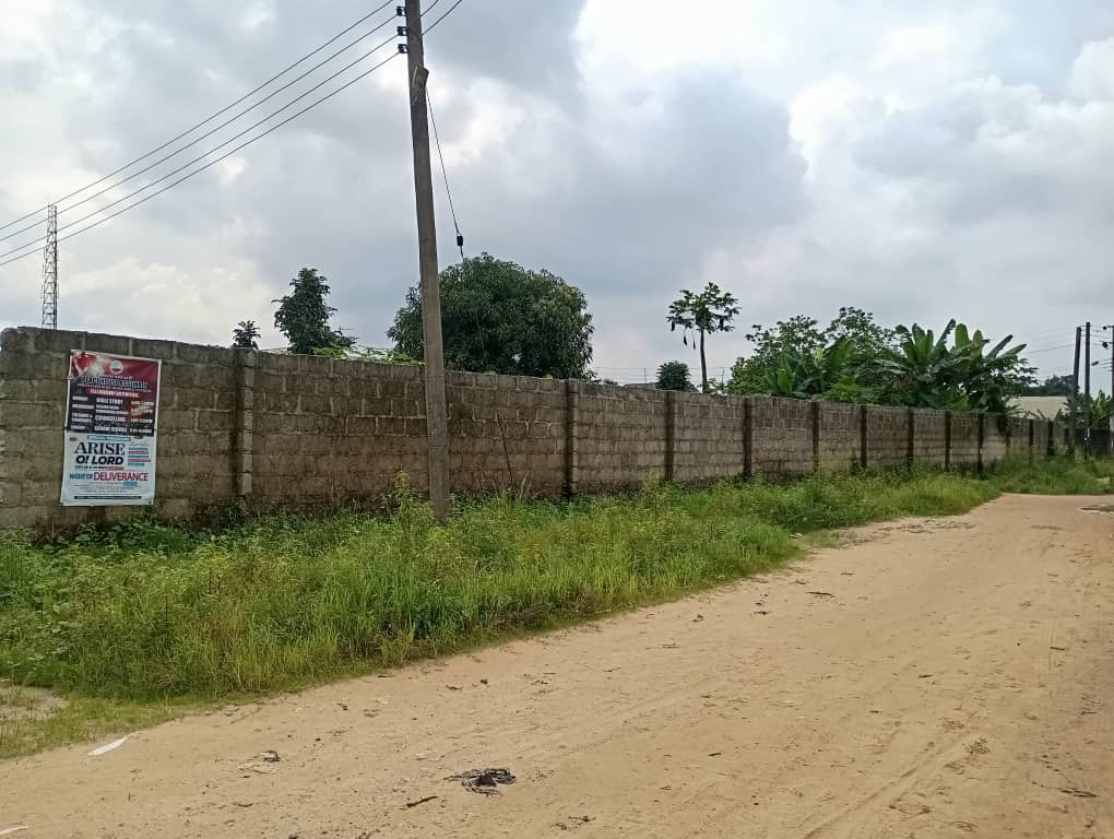 10 plots of land fenced with double two bedroom bungalow inside
